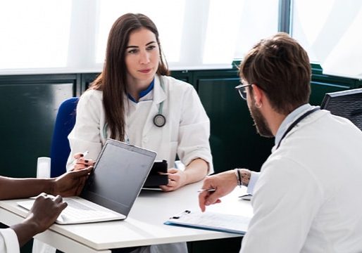 Doctors having discussion in meeting room